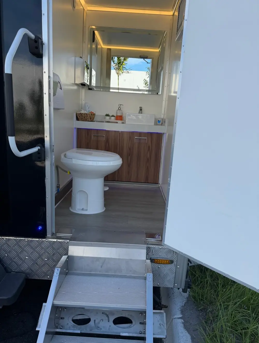 Trailer vanity with sink and soap