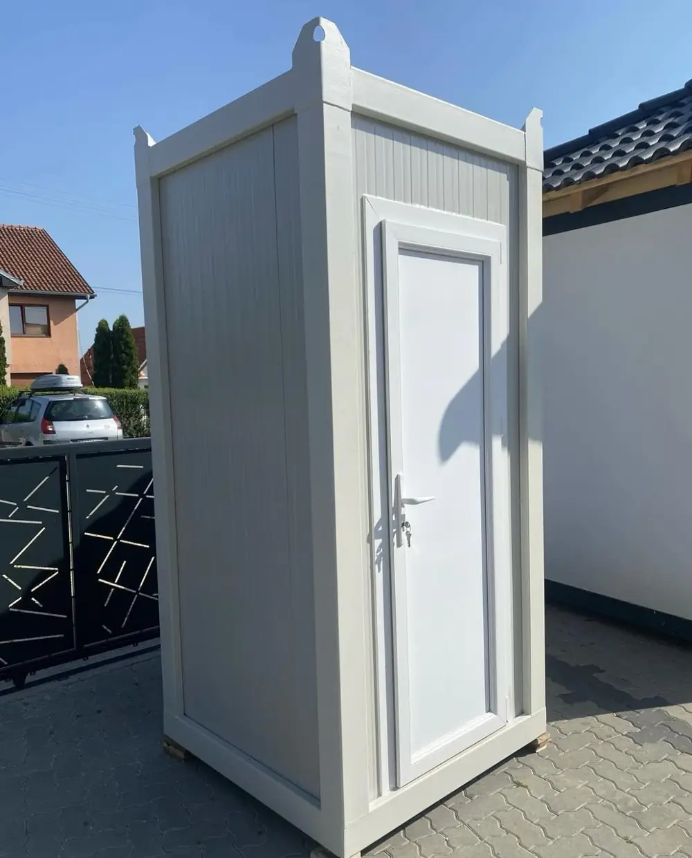Standard porta potty interior with paper holder